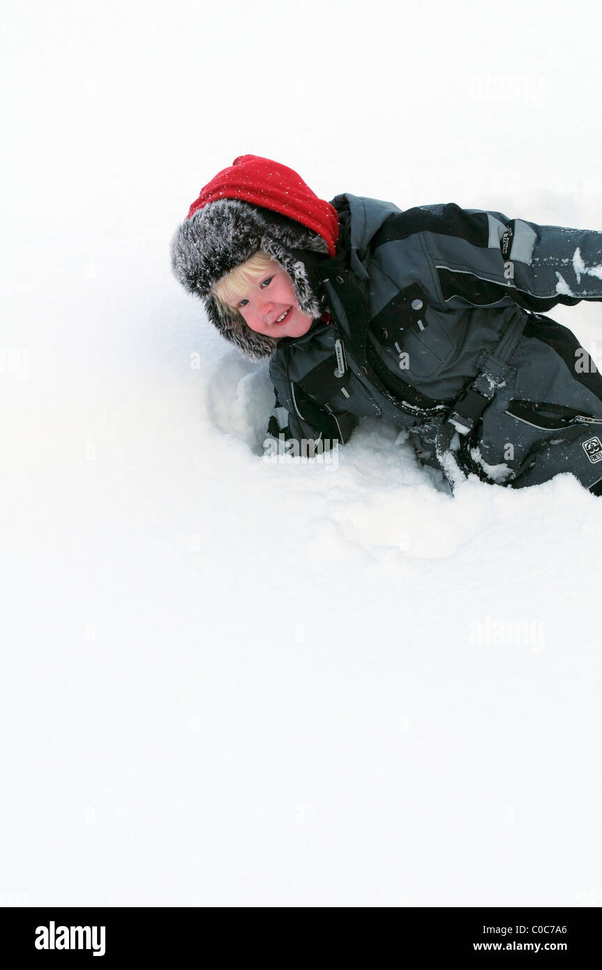 Baby Playing in snow Stock Photo Alamy