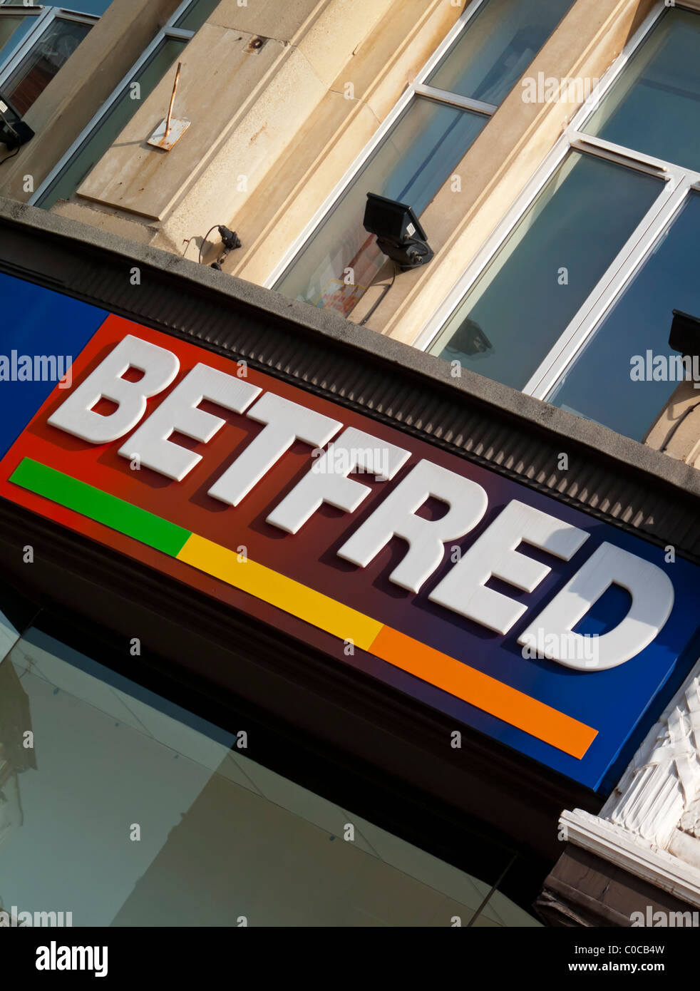 Sign outside Betfred betting shop a UK based bookmaker founded in 1967 by Fred Done Stock Photo