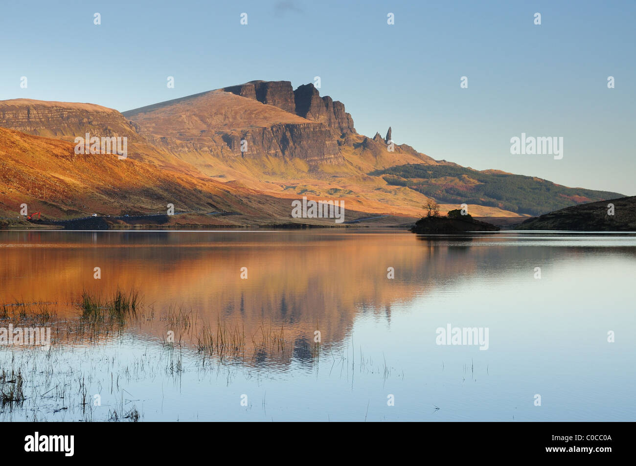 Storr and the Old Man of Storr reflected in Loch Leathan, Isle of Skye, Hebrides, Scotland Stock Photo