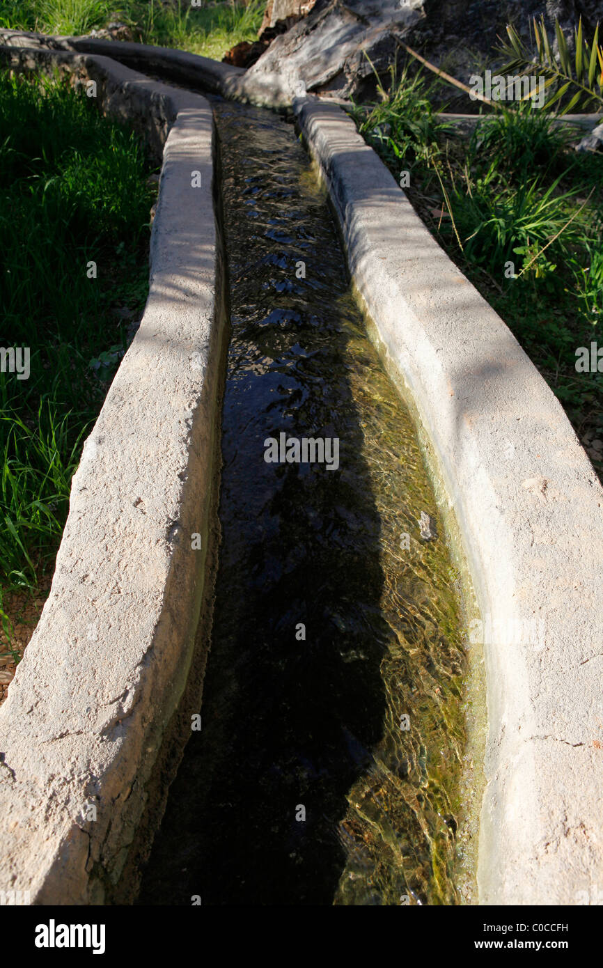 An irrigation channel, known as a Falaj, in the Omani mountain village of Misfah. Stock Photo