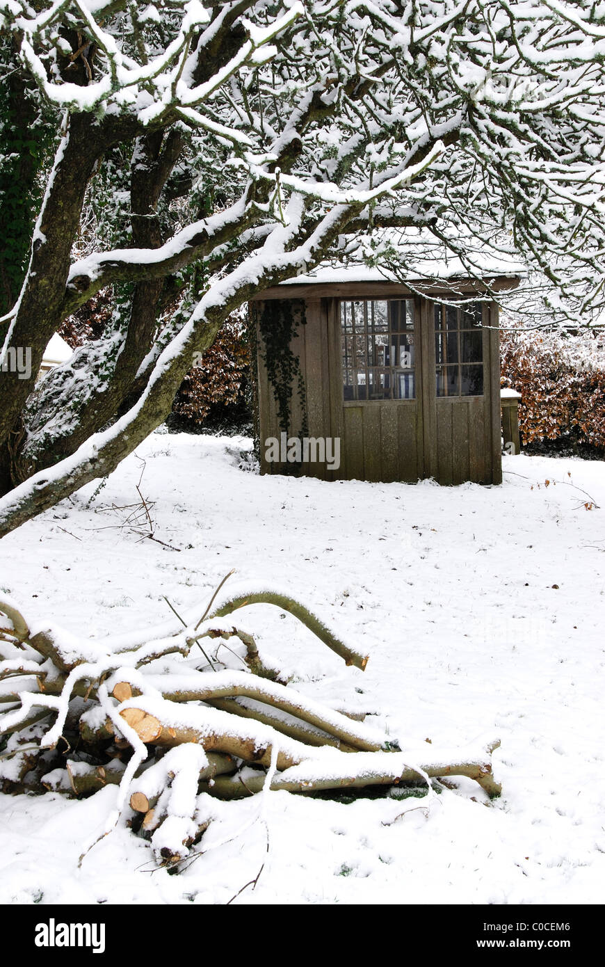 Summerhouse in orchard on winter morning. Dorset, UK December 2010 Stock Photo