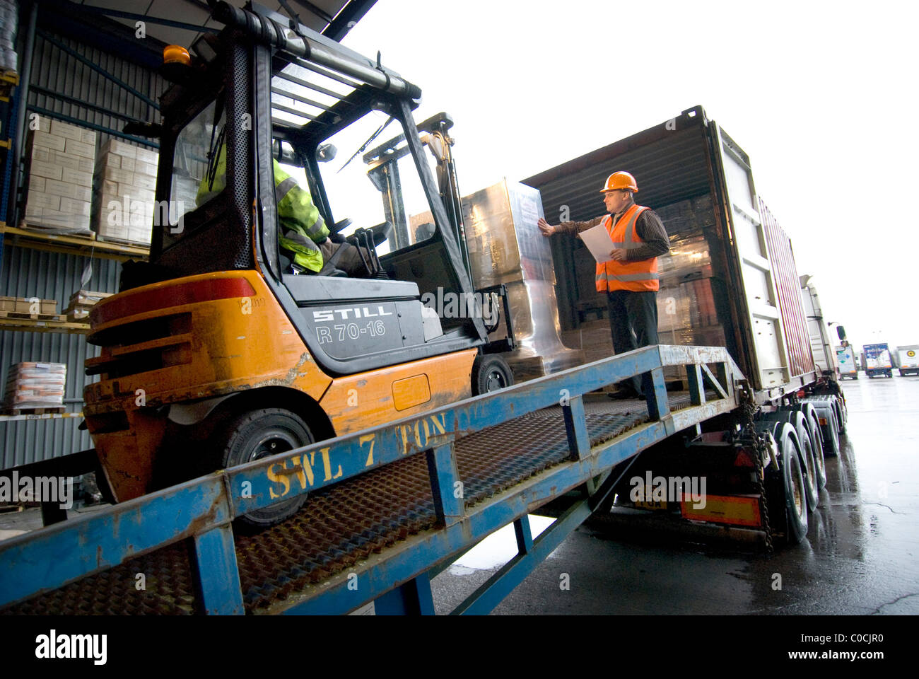 Forklift loading truck goods hi-res stock photography and images - Alamy