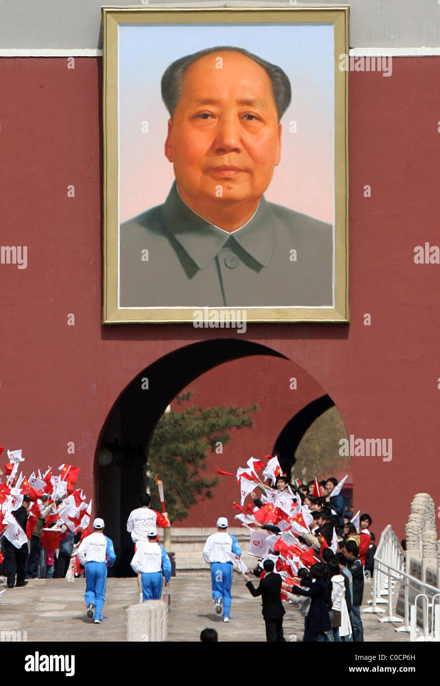China's 110m hurdles recordholder, Liu Xiang carries the Olympic torch