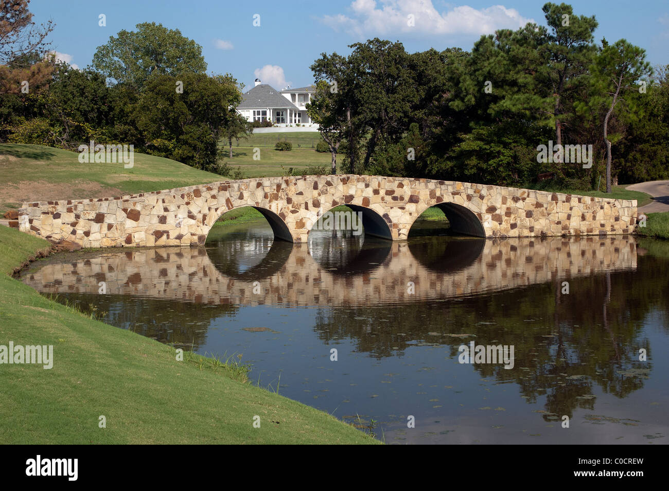 A replica of The Hogan Bridge on 12th hole at Augusta at Tour 18 Golf Course Dallas, 8718 Amen Corner, Flower Mound, Texas, USA. Stock Photo