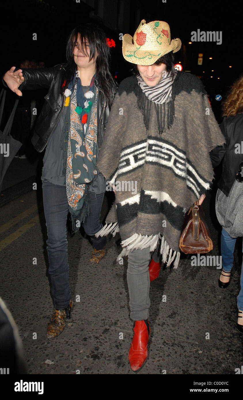 Noel Fielding and Alison Mosshart from The Kills leave the 'Nobby Clark Shoots Noel Fielding - private view' held at Maison Stock Photo