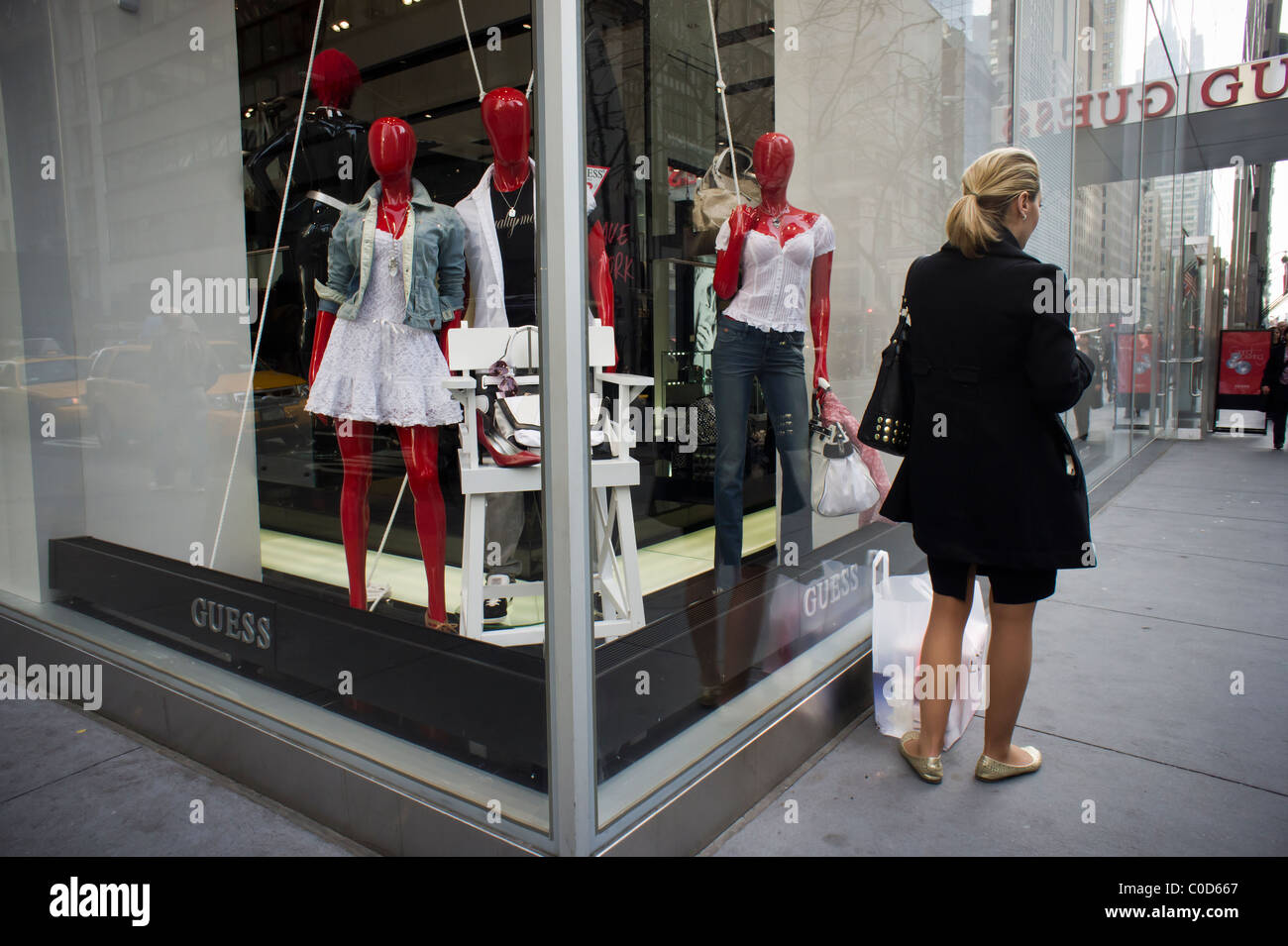 GUESS, the trend setting jeans retailer, opens its new flagship store on  Fifth Avenue in New York Stock Photo - Alamy