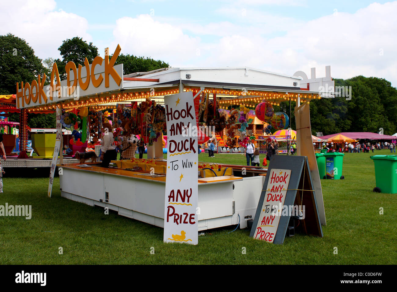 A hook a duck stall at a fair during a classic car event Stock Photo