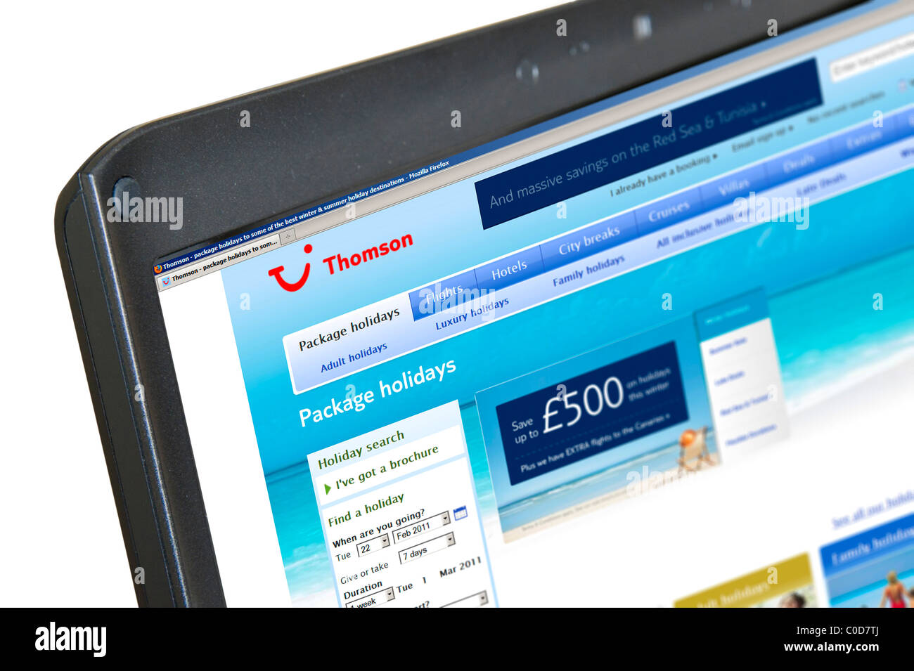 Browsing the Thomson Holidays website, UK Stock Photo