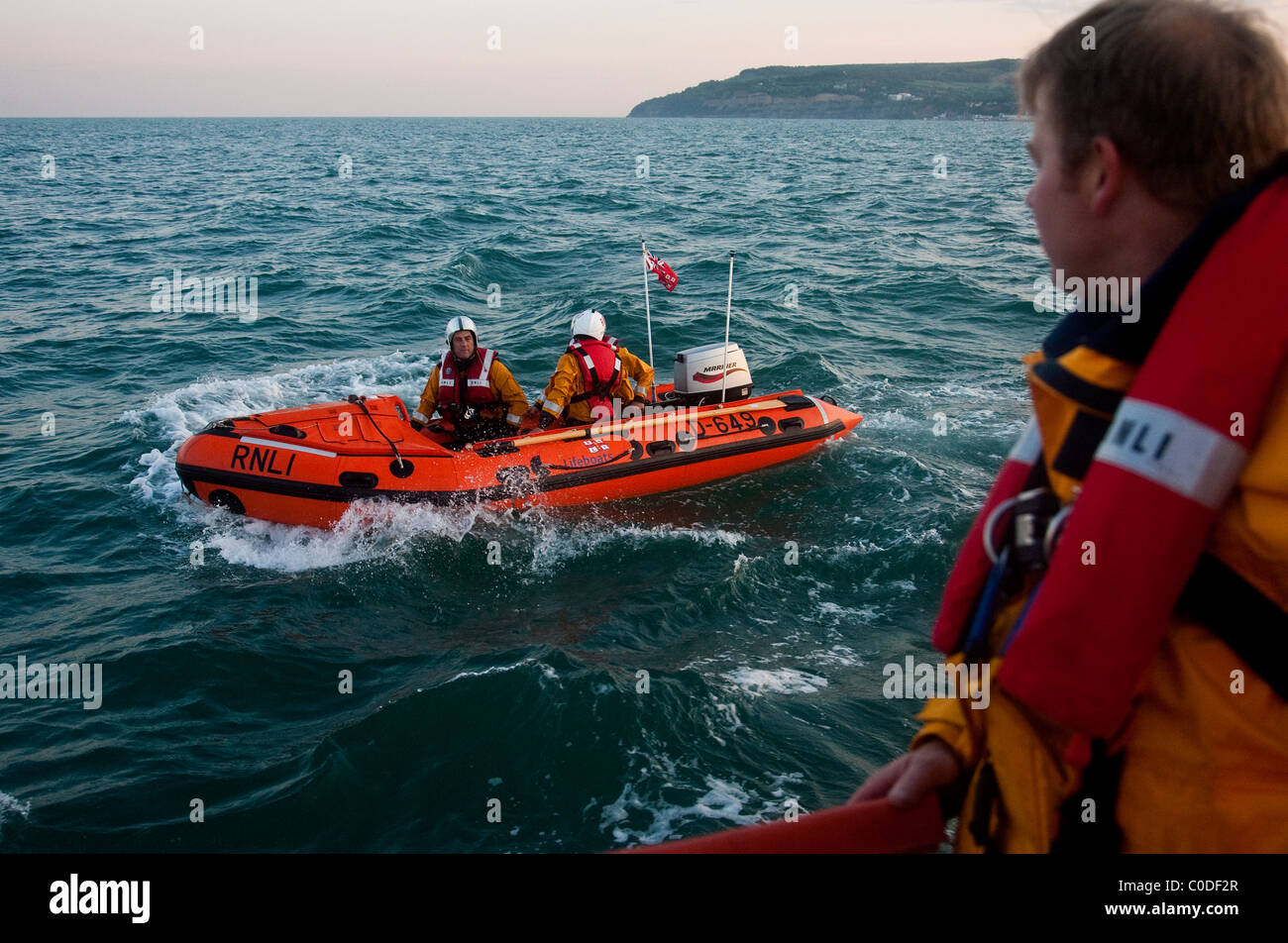 RNLI life boat volunteers out on the Solent from Bembridge RNLI station, Isle of Wight. Photo:Jeff Gilbert Stock Photo