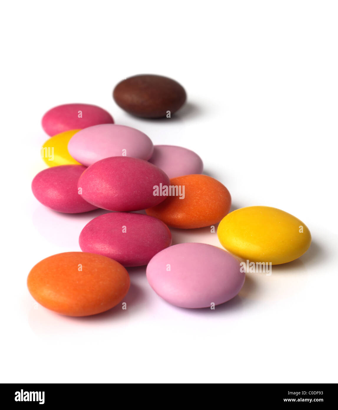 Colorful candy-coated chocolates close up. Stock Photo