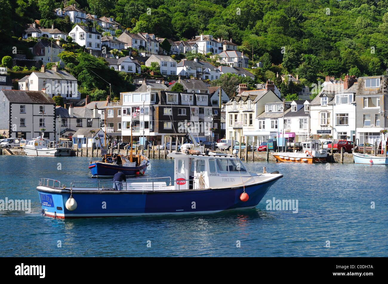 a sea fishing charter boat in the harbour at looe, cornwall, uk Stock