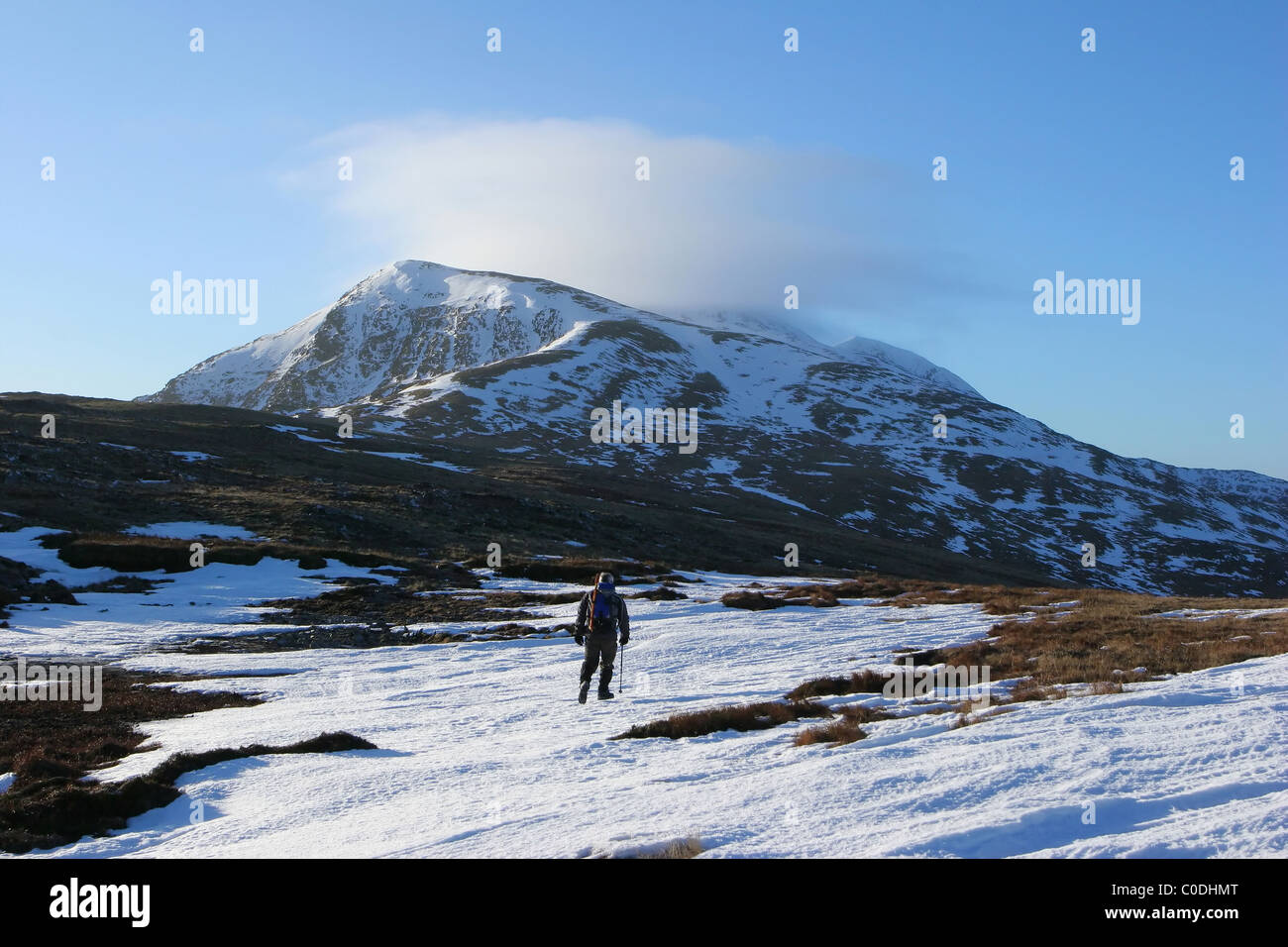 Hiker on the approach to Stob a'Choire Mheadhoin. Stock Photo