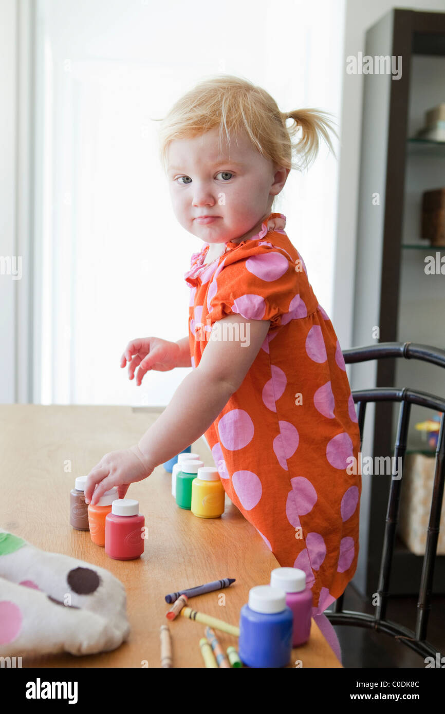 Small child playing with paint hi-res stock photography and images - Alamy