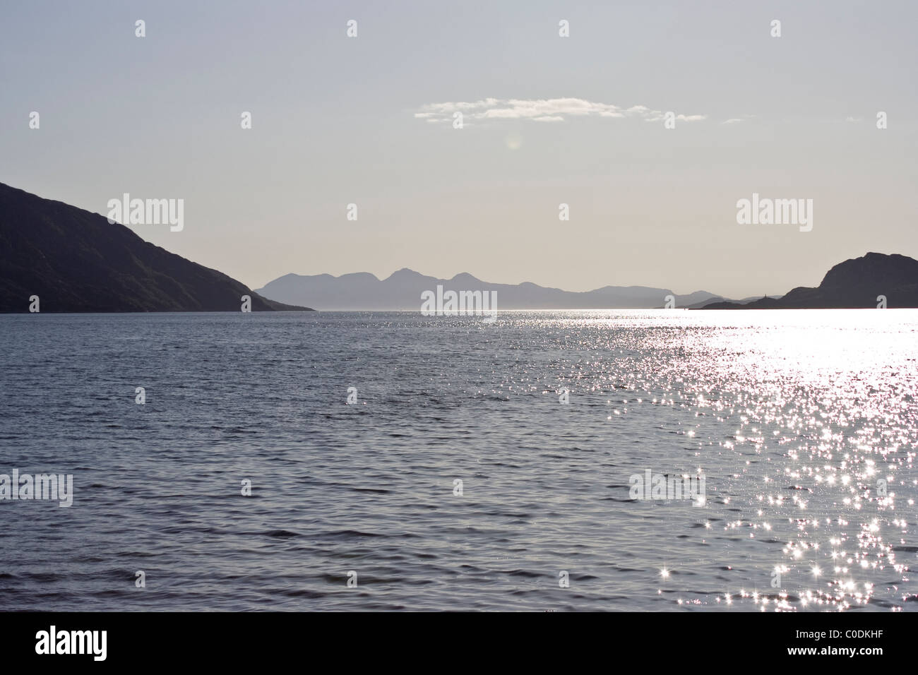 Evening sihouette of Isle of Rum from Inverie, Knoydart Stock Photo