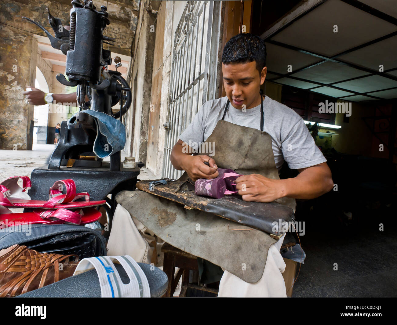 Cobbler shoe repair Street scene Old Havana Stock Photo - Alamy