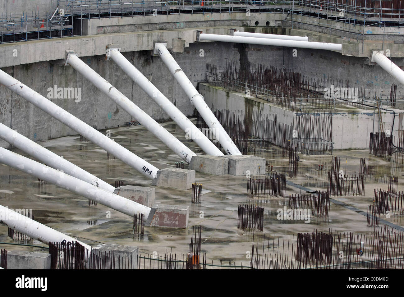 Parts of foundations and wall supports of a building under construction ...