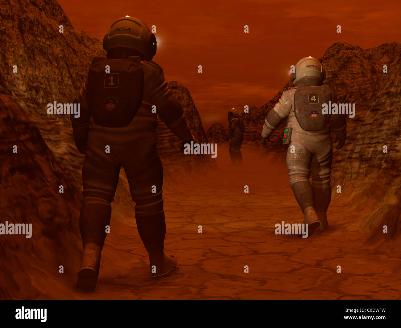 Artist's concept of astronauts exploring a dry gully on Saturn's moon Titan. Stock Photo