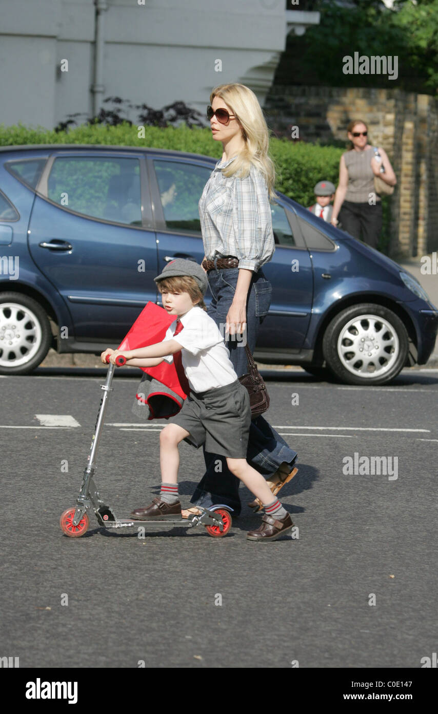 Claudia Schiffer walks her son Caspar to school in a pair of very large denim flares London, England - 13.05.08 Stock Photo