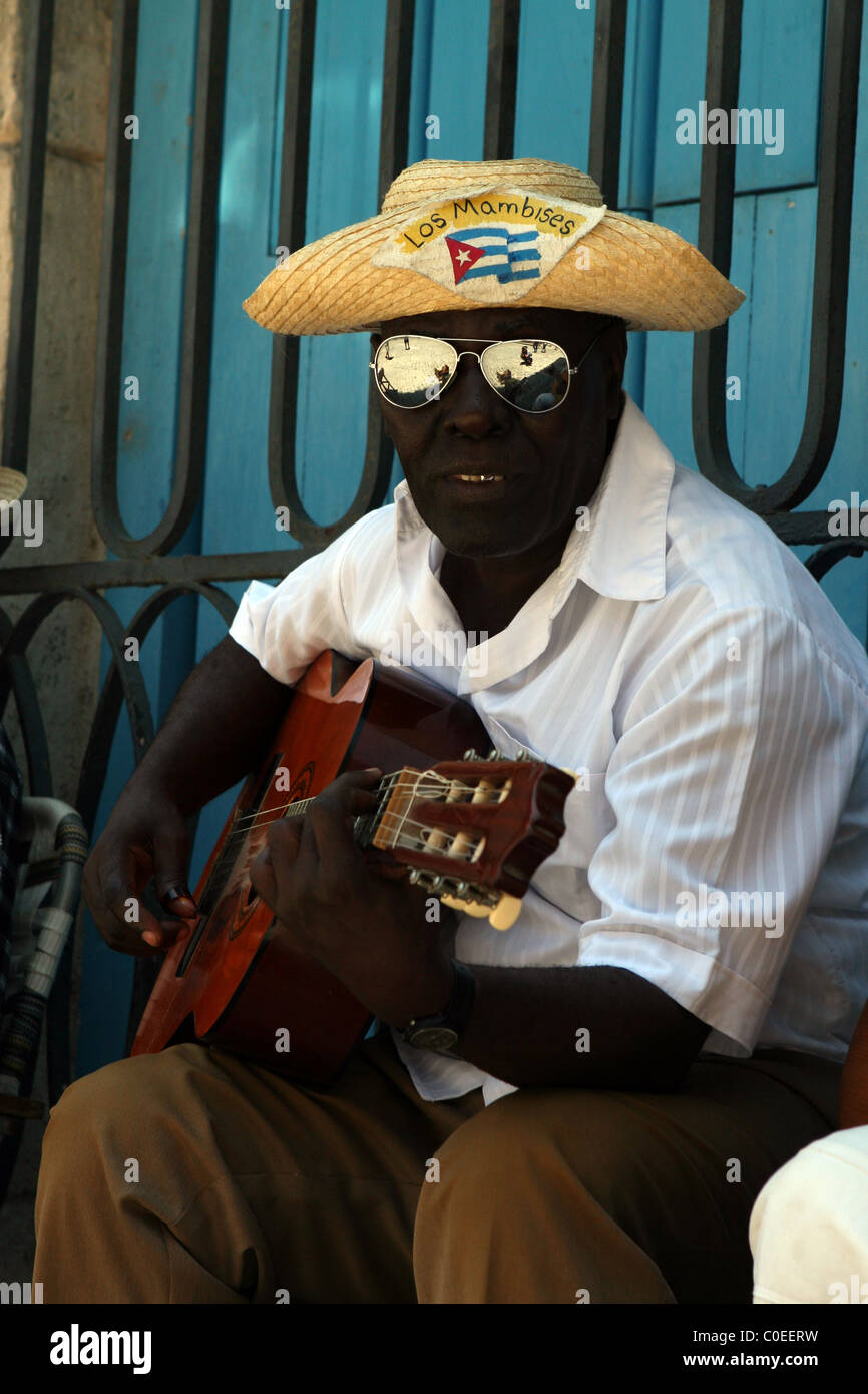 Guitar player for the Los Mambises street band. Stock Photo