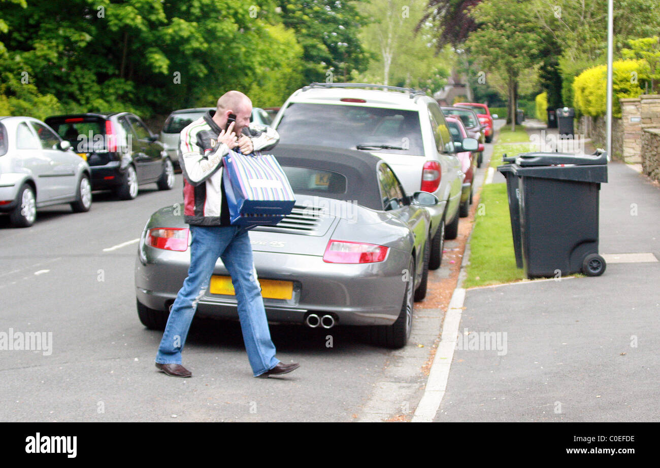 Mark Croft arrives home after a day's shopping with his wife. London ...