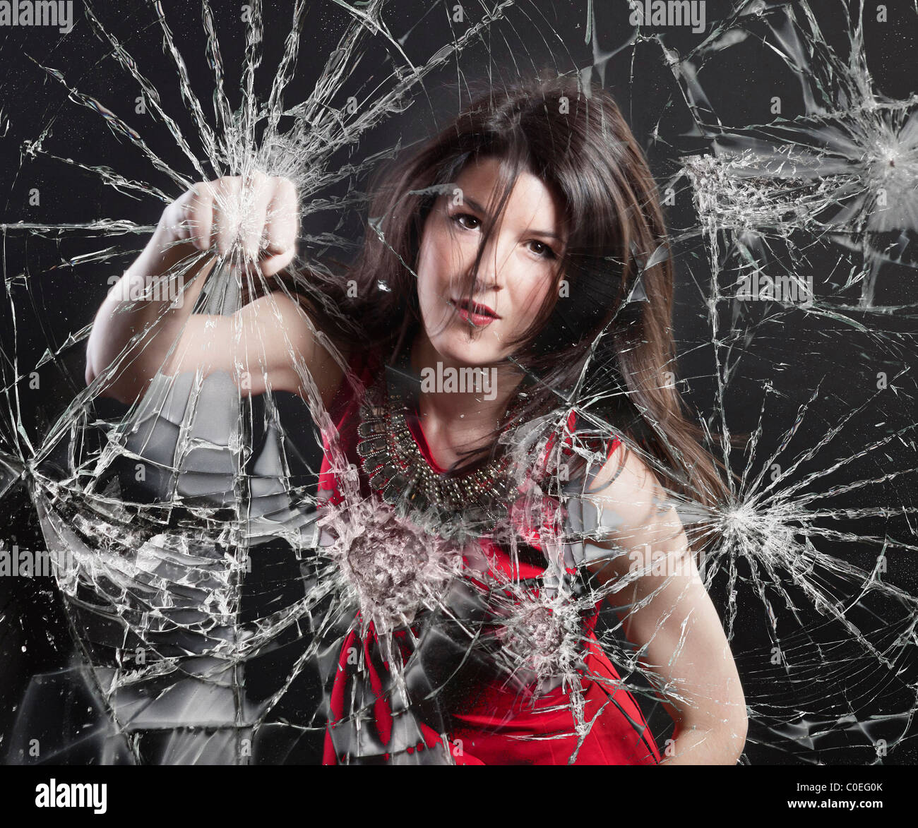 Punching breaking glass hi-res stock photography and images - Alamy