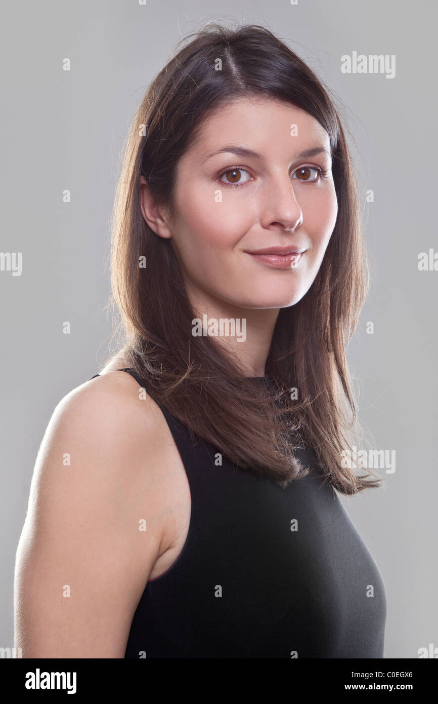 A studio portrait of a young woman Stock Photo - Alamy