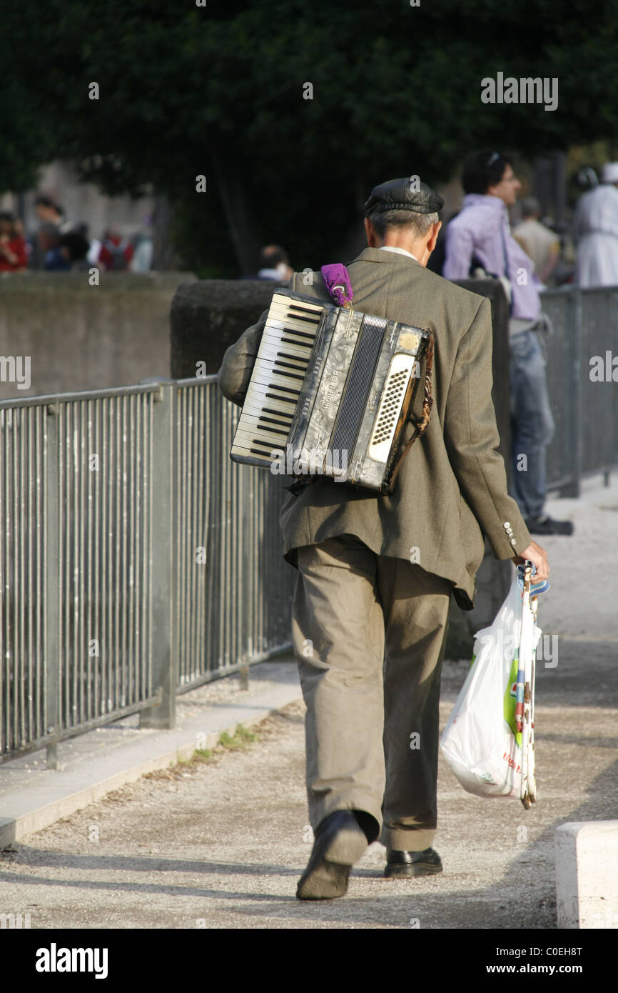 old man busker accordion player in street in rome italy Stock Photo Alamy