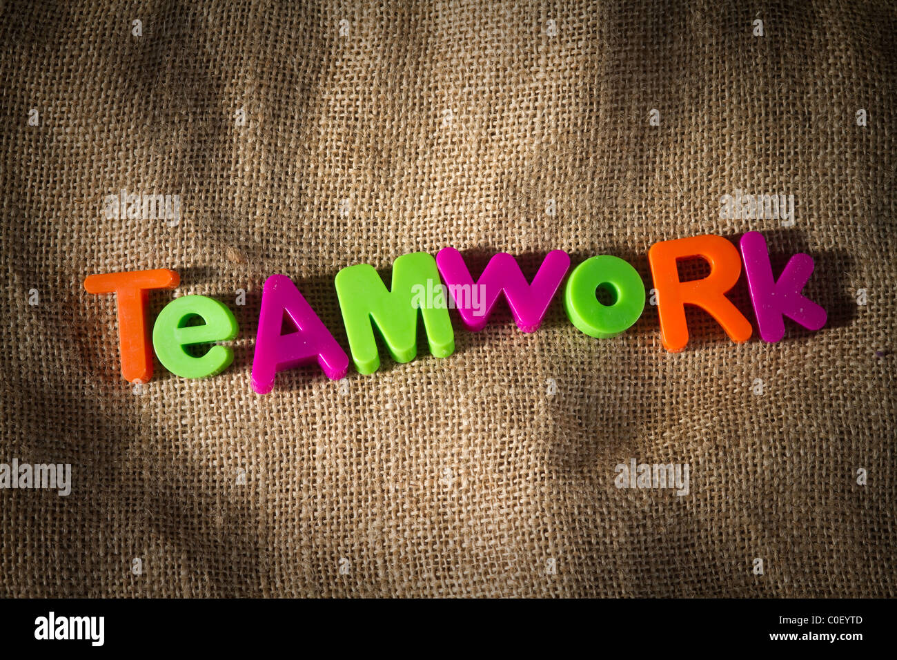 Teamwork Dictionary Definition Low key close up Stock Photo Alamy