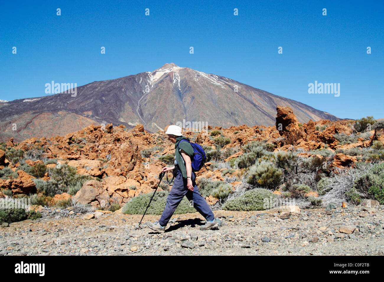 Mature woman walking in Parque Nacional del Teide. Tenerife Canary Islands, Spain. Stock Photo