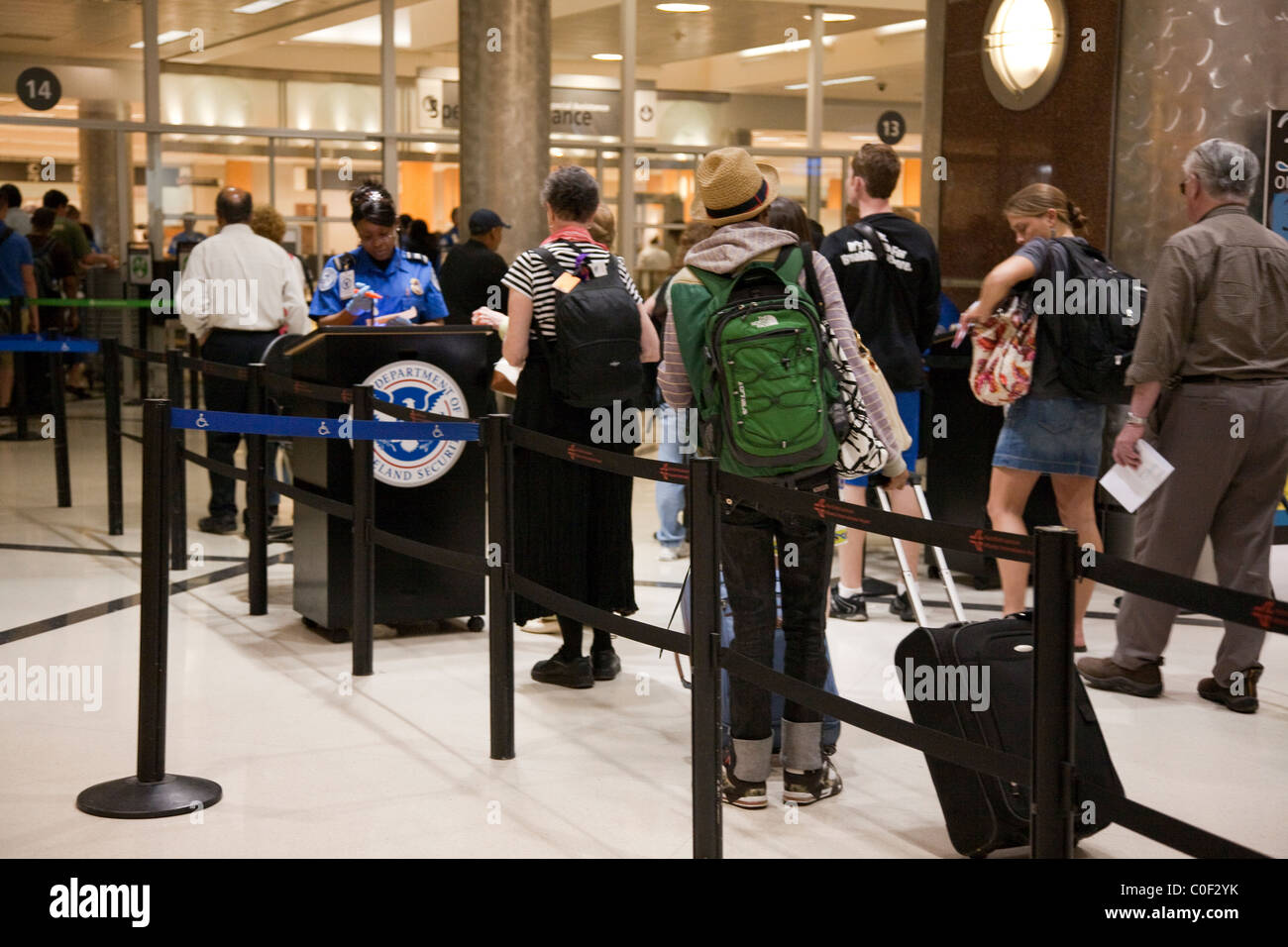 Passengers wait in line at security at the Atlanta, GA airport. April 2010 Stock Photo