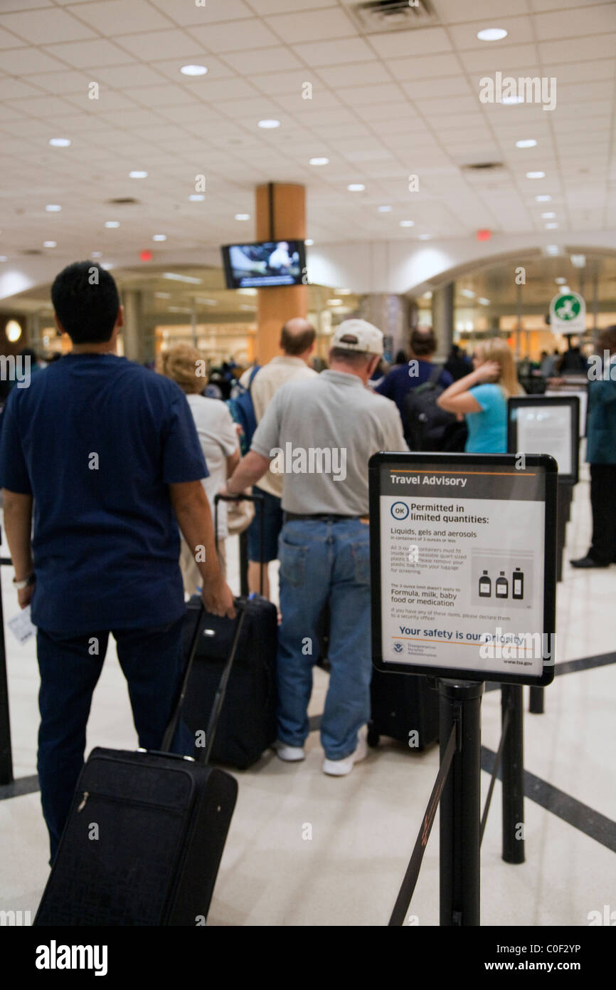 Passengers wait in line at security at the Atlanta, GA airport. April 2010 Stock Photo