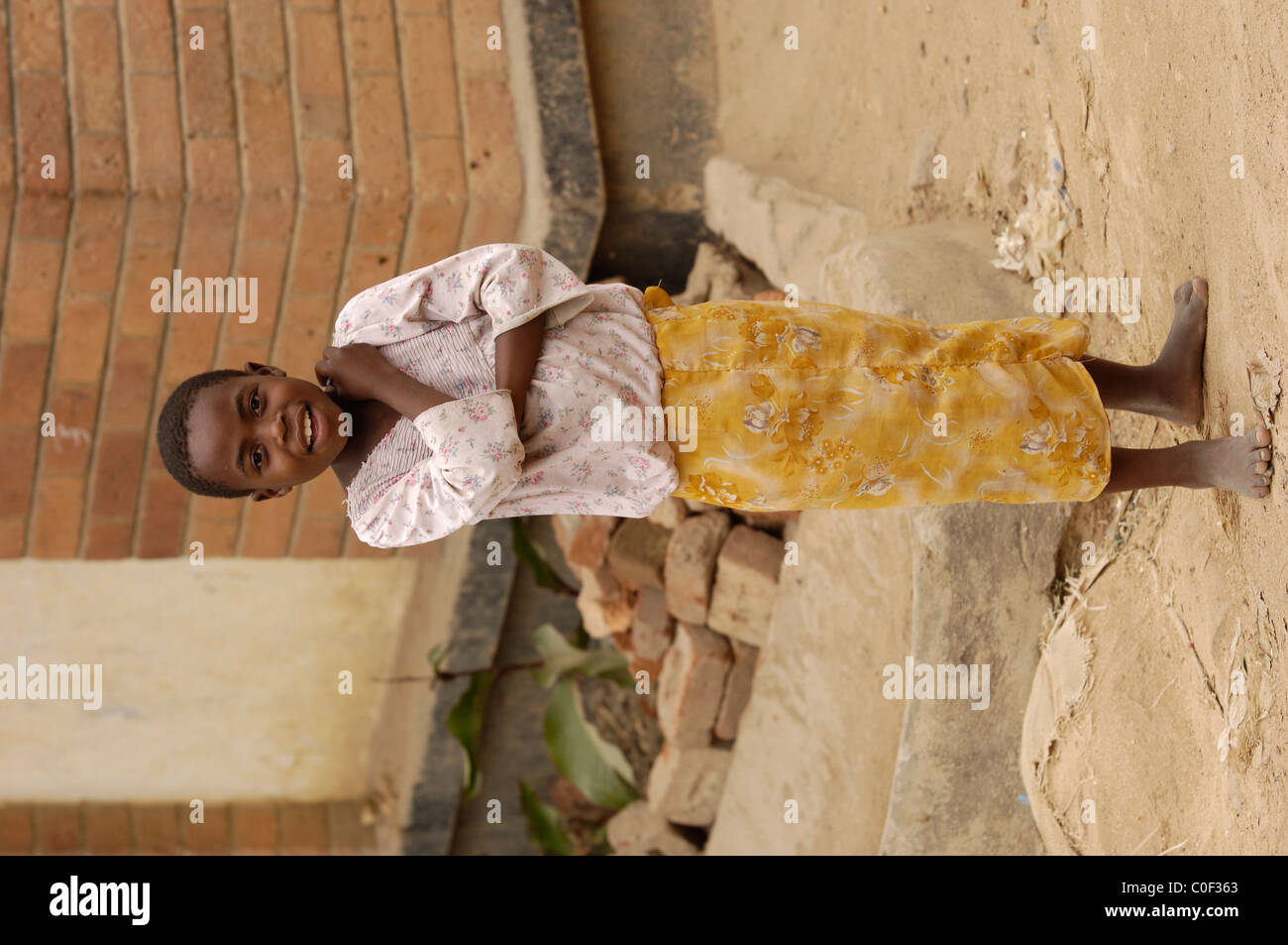 Malawi girl in bare feet Stock Photo Alamy