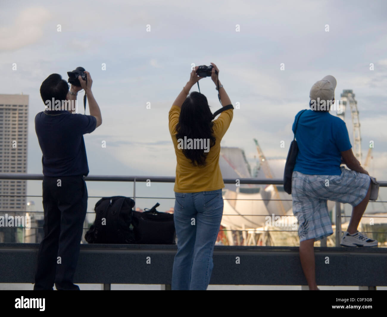 Singaporeans watch/photograph rehearsal for independence day festival Stock Photo
