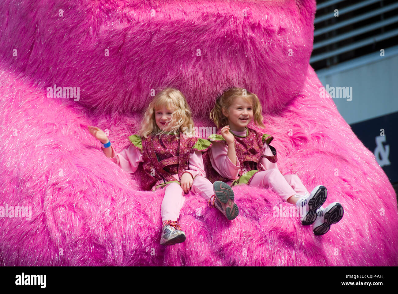 Pink monster family float in the Credit Union Christmas Pageant through the streets of Adelaide, South Australia. Stock Photo