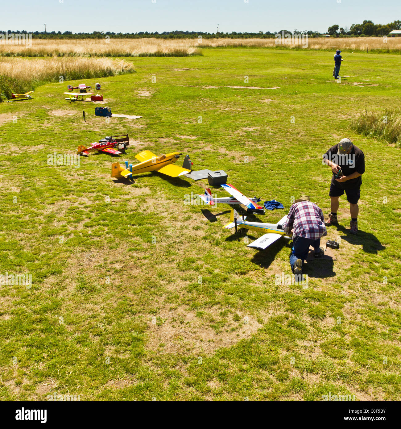 Men flying Radio Control Aircraft Stock Photo - Alamy