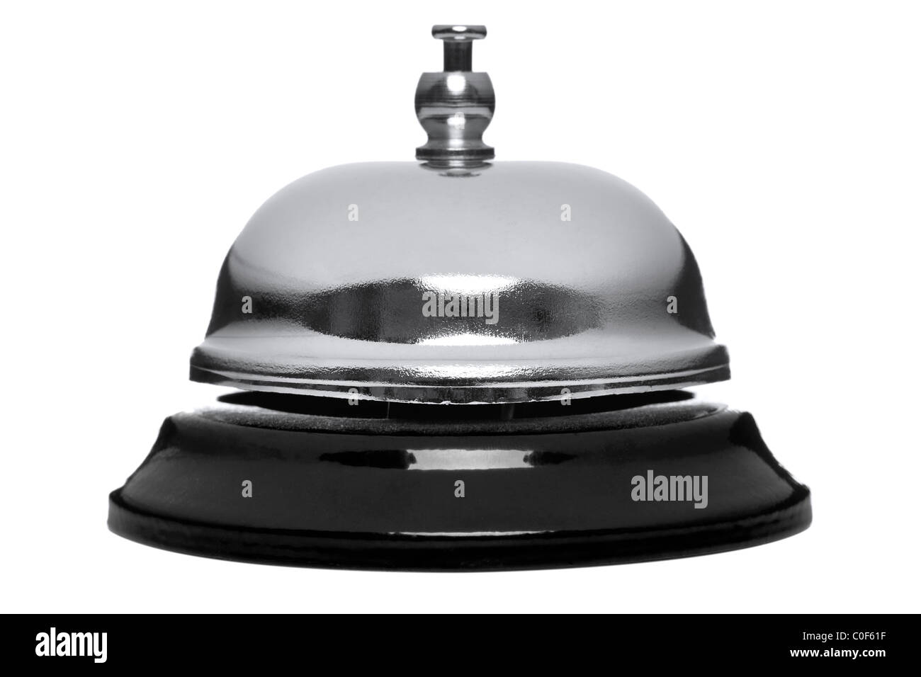 Photo of a chrome reception bell isolated on a white background. Stock Photo