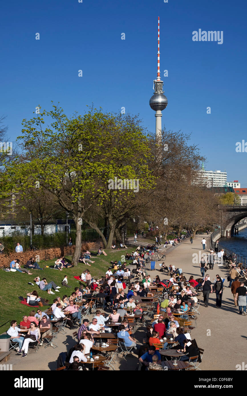 Promenade at river Spree ,beach bar , beer garden, Alex TV Tower, Berlin , Germany Stock Photo