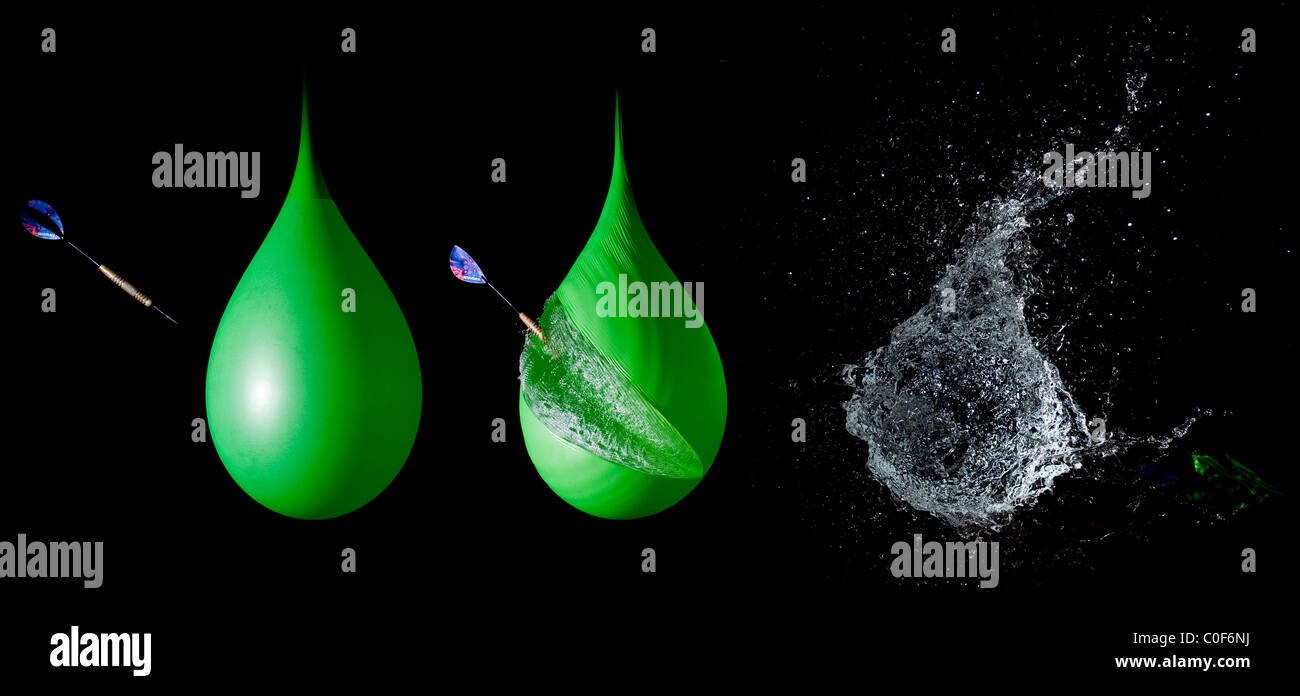 An image using high speed flash photography showing the sequence of bursting a balloon filled with water using a dart . Stock Photo
