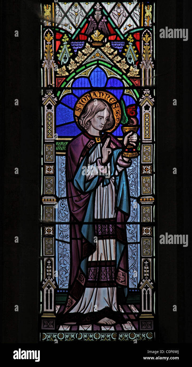 A stained glass window depicting the Apostle John the Evangelist, Battlefield Church, Shropshire Stock Photo