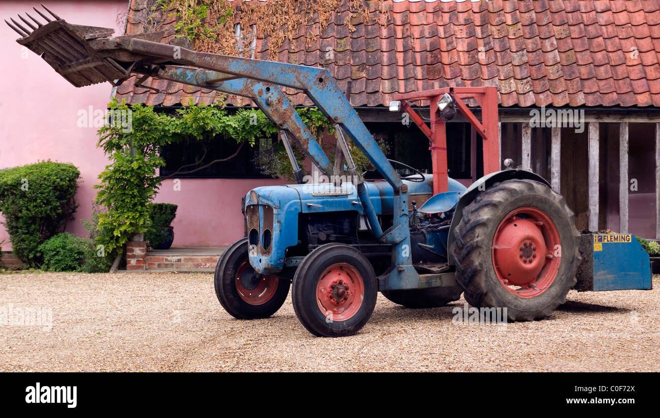 Fordson Dexter tractor with front loader. Stock Photo