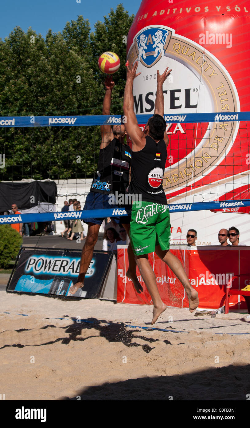 beach volley player spiking Stock Photo Alamy
