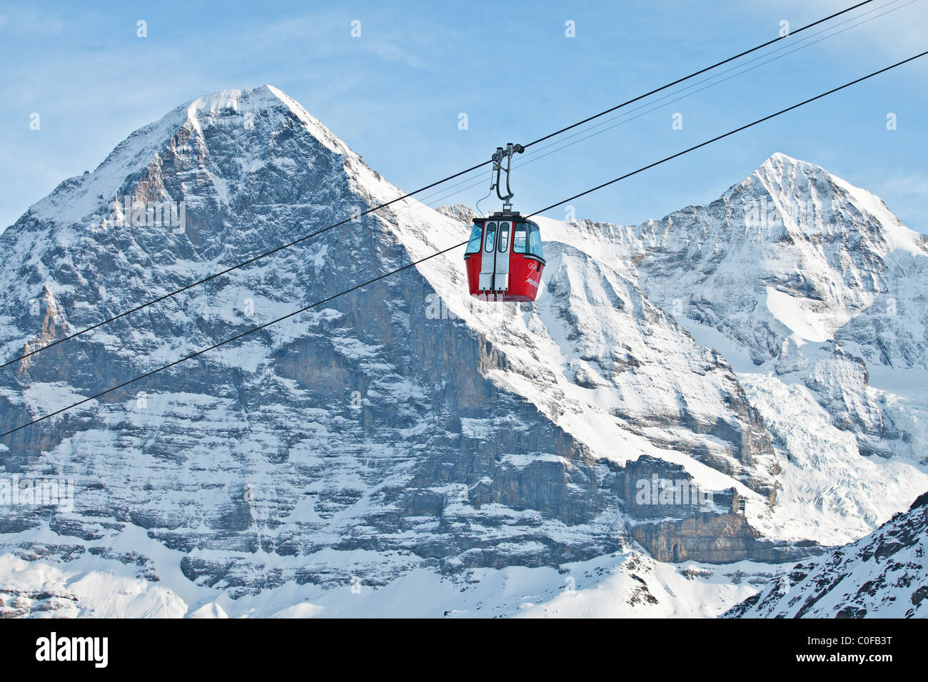 Cabin Ski lift with Mt Eiger on the left side and Mt Monch on the right side, Mannlichen, Grindelwald, Switzerland Stock Photo