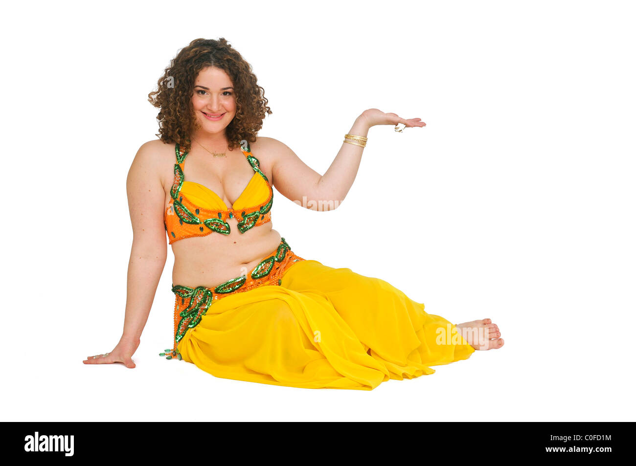 Belly dancer offers her hand On white Background Stock Photo