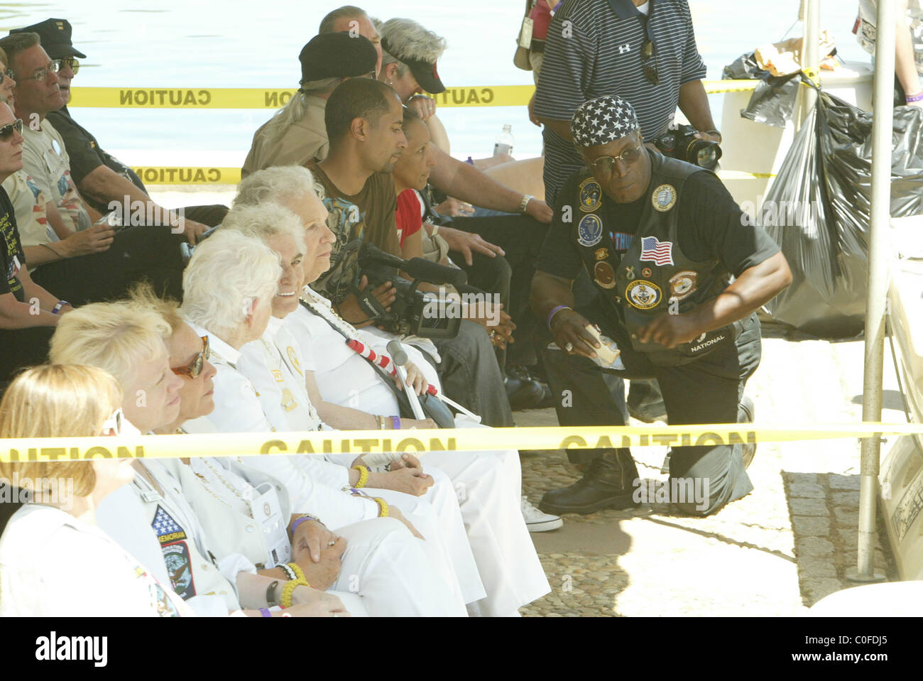 Gold Star Mothers and John Amos with his son Rolling Thunder held its