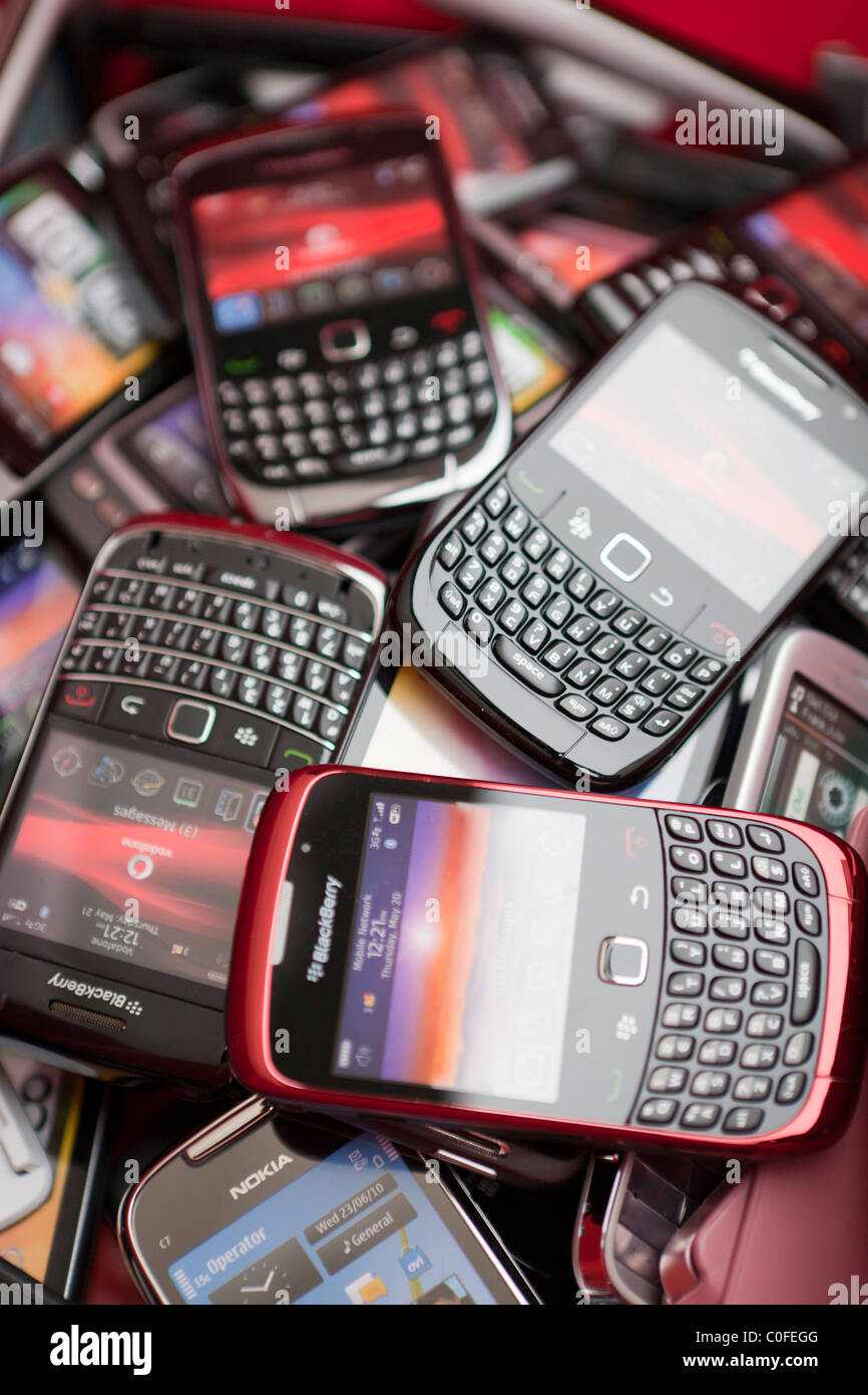 Pile of smart mobile phones Stock Photo