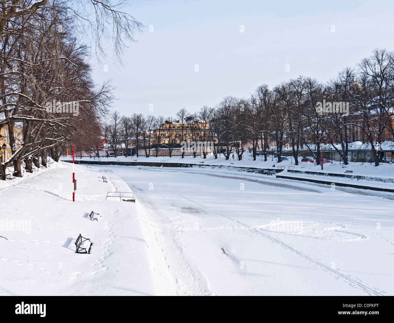 River Aura frozen in winter with valentine's heart traced in the snow, Turku (Abo), South-western Finland Stock Photo
