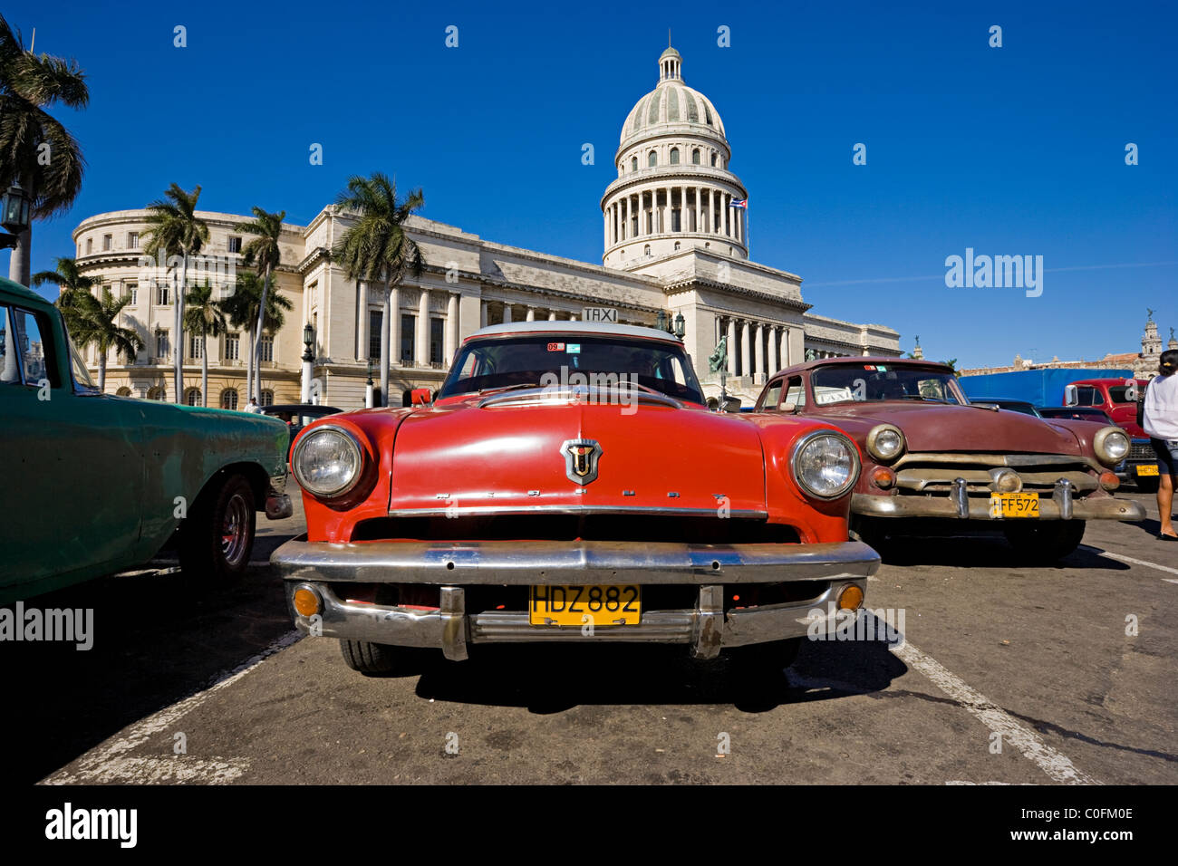 An old American 1950s Mercury automobile outside the Capitol building in Havana  Cuba Stock Photo