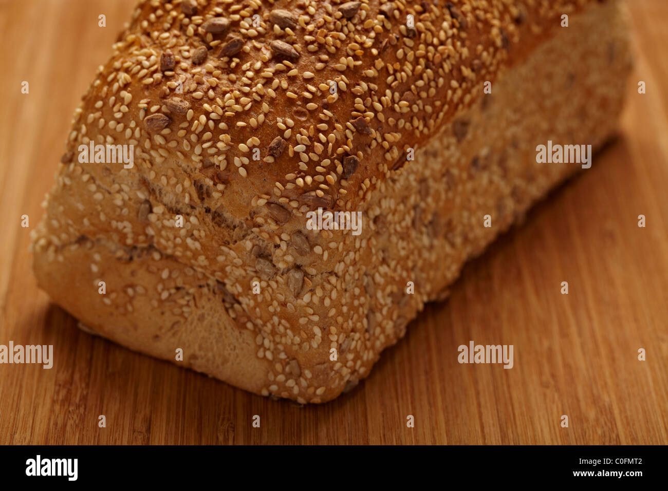 Freshly baked bread on a bamboo chopping board Stock Photo