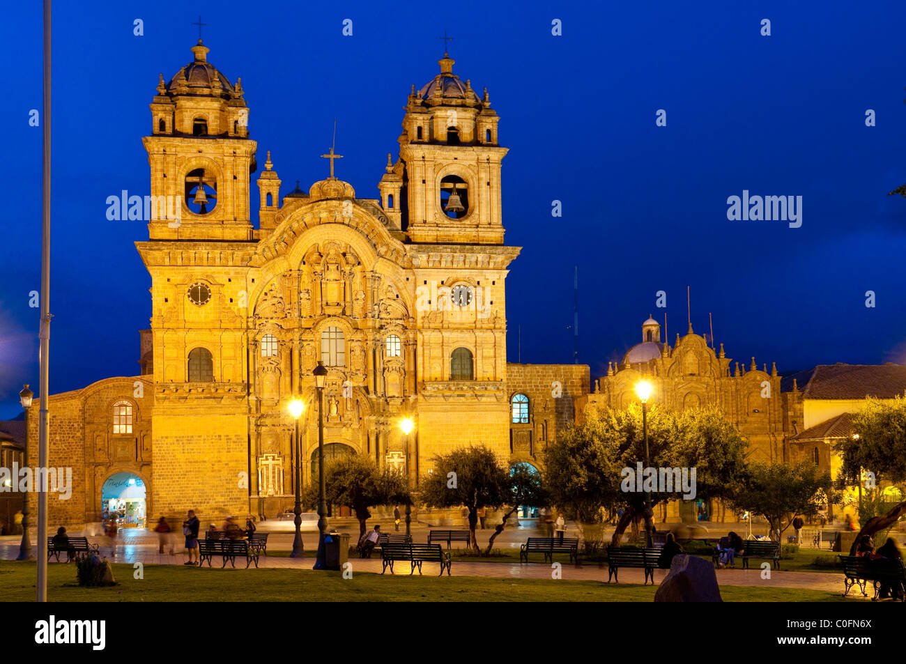 The Church of La Compania de Jesus illuminted at dusk on the Plaza de Armas in Cusco, Peru, South America. Stock Photo