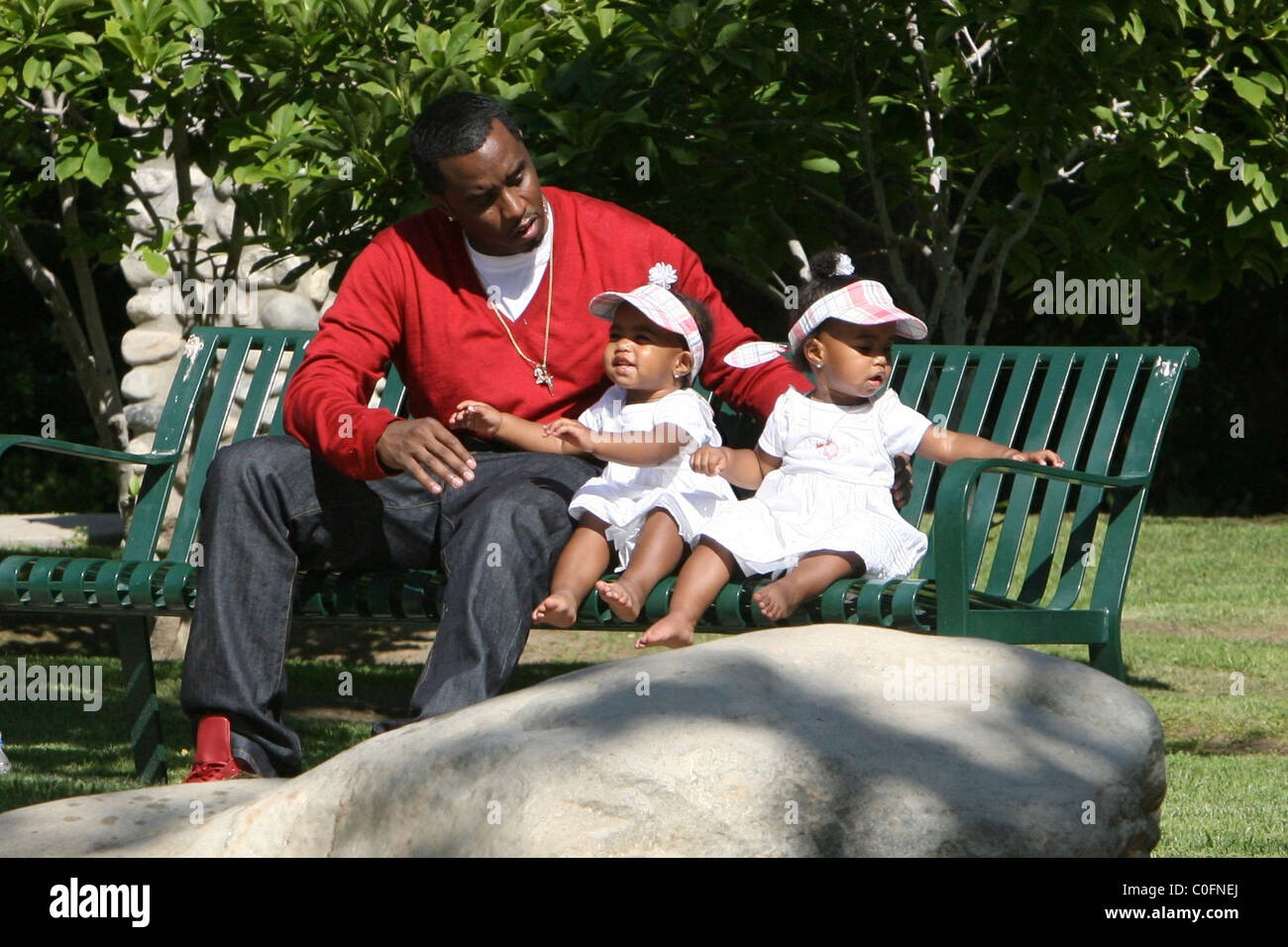 Sean 'P. Diddy' Combs plays with his twin daughters D'Lila Star Combs and Jessie James Combs in Sean 'P. Diddy' Combs plays with his twin daughters D'Lila Star Combs and Jessie James Combs in
